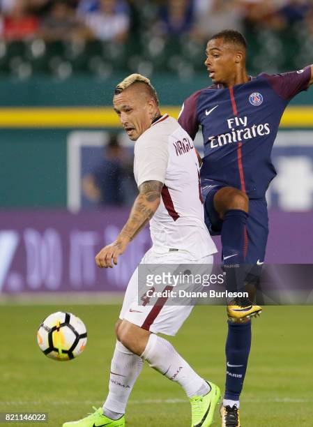 Antoine Bernede of Paris Saint-Germain and Radja Nainggolan of AS Roma chases a ball during the second half at Comerica Park on July 19, 2017 in...