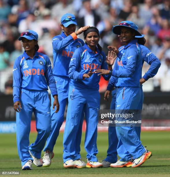 Rajeshwari Gayakwad is congratulated by team-mates after taking a wicket during the ICC Women's World Cup 2017 Final between England and India at...