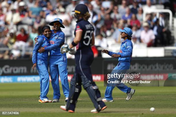 India's Rajeshwari Gayakwad celebrates after taking the wicket of England's Lauren Winfield during the ICC Women's World Cup cricket final between...