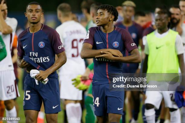 Antoine Bernede of Paris Saint-Germain and Christopher Nkunku of Paris Saint-Germain walk of the pitch after a win over AS Roma at Comerica Park on...