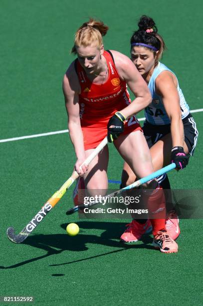 Nicola White of England tackled by Maria Granatto of Argentina during day 9 of the FIH Hockey World League Women's Semi Finals 3rd-4th place match...