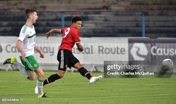 Nishan Burkart of Manchester United shoots at goal during the NI Super Cup game between Manchester United u18s and Northern Ireland u18s at the...