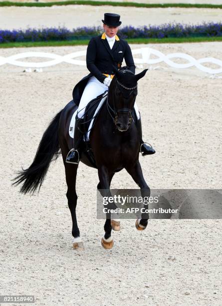 German rider Isabell Werth on her horse Weihegold OLD competes in the Grand Prix Freestyle CDIO during the World Equestrian Festival CHIO in Aachen...