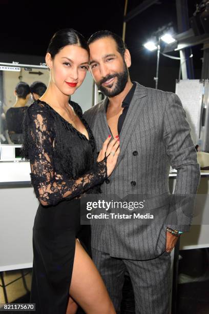 Rebecca Mir and her husband Massimo Sinato during the Unique show during Platform Fashion July 2017 at Areal Boehler on July 22, 2017 in Duesseldorf,...