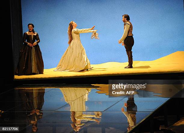Marina Poplavskaya playing Desmonda, Barbara Di Castri as Emilia and Stephen Costello as Cassio perform Giuseppe Verdi's Otello, a dramma lirico in...