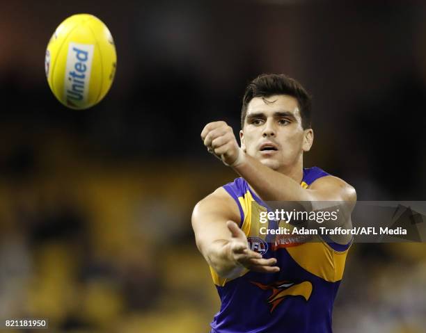 Tom Cole of the Eagles handpasses the ball during the 2017 AFL round 18 match between the Collingwood Magpies and the West Coast Eagles at Etihad...