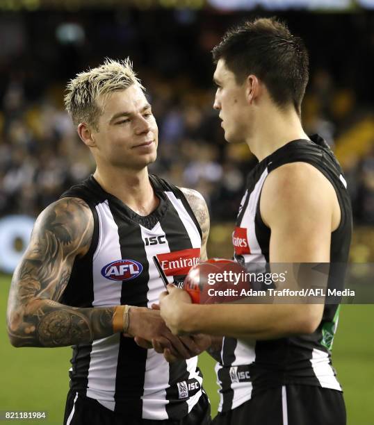 Jamie Elliott of the Magpies celebrates with Brayden Maynard of the Magpies during the 2017 AFL round 18 match between the Collingwood Magpies and...