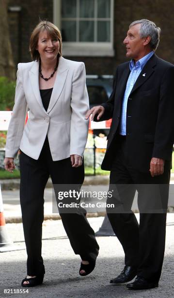 Leader of Unite, Tony Woodley walks with Deputy leader of the Labour Party Harriet Harman during a Daily Mirror Fair Tips Campaign, outside number 10...