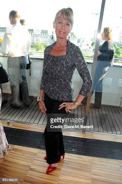 Jan Leeming, wearing ruby slippers, attends the Swarowski pre party to the opening night of The Wizard of Oz at the Royal Festival Hall on July 29,...