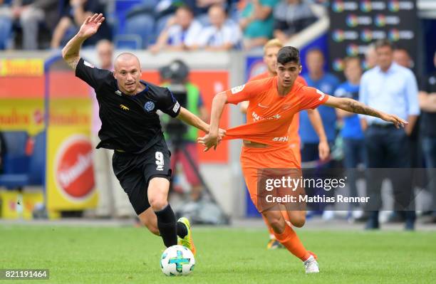 Simon Brandstetter of MSV Duisburg and Pablo Fornals of FC Malaga during the game between MSV Duisburg and FC Malaga on july 23, 2017 in Duisburg,...