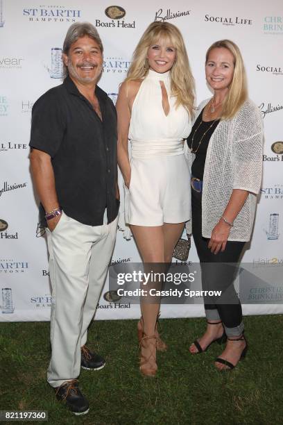 Mark Baron, Christie Brinkley and Jane Babcook attend the 6th Annual St. Barth Hamptons Gala at Bridgehampton Historical Museum on July 22, 2017 in...