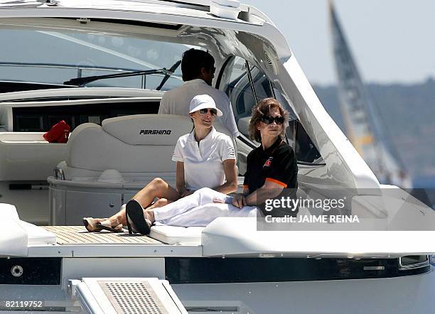 Spain's Princess Letizia and Queen Sofia watch the third day of racing in the Copa del Rey regatta off the coast of Palma de mallorca on July 30,...