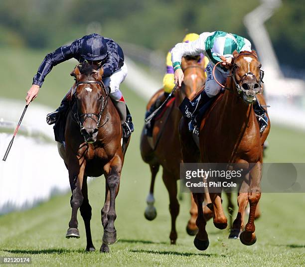 Henrythenavigator ridden by Johnny Murtagh on the left wins the BGC Sussex Stakes run at Goodwood Racecourse on July 30 in Goodwood, England. Today...