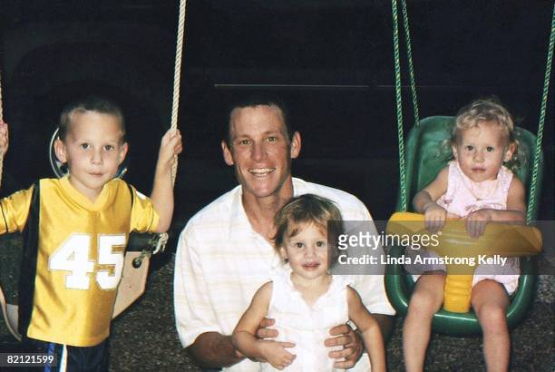 Cycling: Portrait of Lance Armstrong with children, his son Luke and twin daughters Isabelle and Grace, TX 1/1/2003--