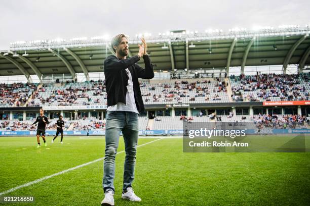 Mattias Bjarsmyr of IFK Goteborg is thanked by the fans and Mats Gren before the Allsvenskan match between IFK Goteborg and Orebro SK at Gamla Ullevi...