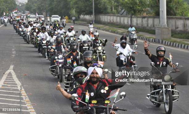 Bikers take part in the 'Kargil Parakram Parade' on the occasion of Kargil Vijay Diwas, from Yamuna Sports Complex to India Gate, on July 23, 2017 in...