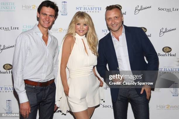 Ilya Novokshanov, Christie Brinkley and Victor Novoselov attend the 6th Annual St. Barth Hamptons Gala at Bridgehampton Historical Museum on July 22,...