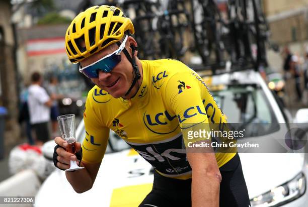 Chris Froome of Great Britain and Team Sky grabs a glass of champagne during stage twenty one of Le Tour de France 2017 on July 23, 2017 in Paris,...