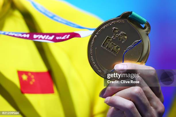 Detailed view of the gold medal as Yang Sun of China celebrates winning gold in the Men's 400m Freestyle Final on day ten of the Budapest 2017 FINA...