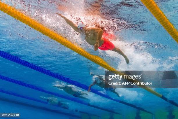 This picture taken with an underwater camera shows China's Sun Yang competing in the men's 400m freestyle final during the swimming competition at...