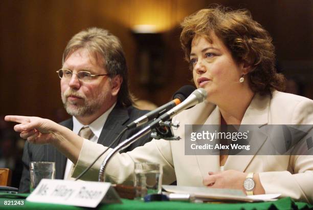 Recording Industry Association of America President and CEO Hilary Rosen, right, testifies as Gerry Kearby of Liquid Audio listens during a hearing...