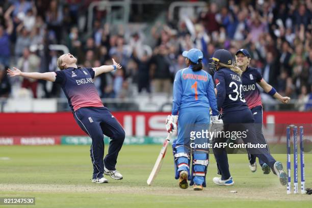 England's Anya Shrubsole celebrates as she takes the wicket of India's Rajeshwari Gayakwad to win the ICC Women's World Cup cricket final between...