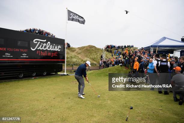 Jordan Spieth of the United States plays his third shot from the practise range after a penalty drop on the 13th hole during the final round of the...