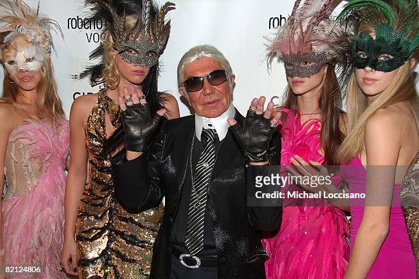 Designer Roberto Cavalli dressed as Karl Lagerfeld, and guests arrive to his Halloween Party at Cipriani 42nd Street in New York City on October 31,...
