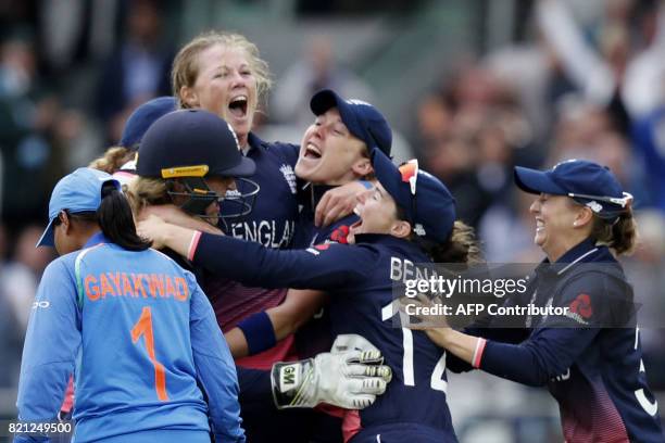 England's Anya Shrubsole celebrates as she takes the wicket of India's Rajeshwari Gayakwad to win the ICC Women's World Cup cricket final between...