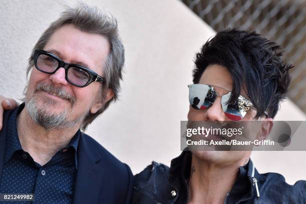 Actor Gary Oldman and magician Criss Angel attend the ceremony honoring Criss Angel with star on the Hollywood Walk of Fame on July 20, 2017 in...