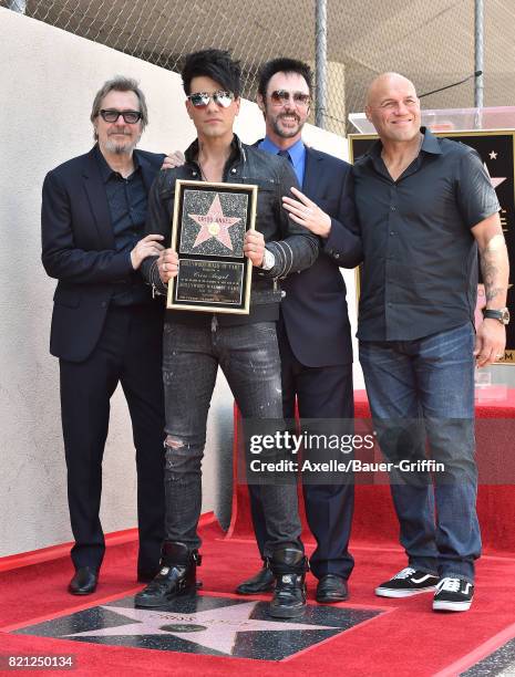 Actor Gary Oldman, magicians Criss Angel, Lance Burton and actor Randy Couture attend the ceremony honoring Criss Angel with star on the Hollywood...