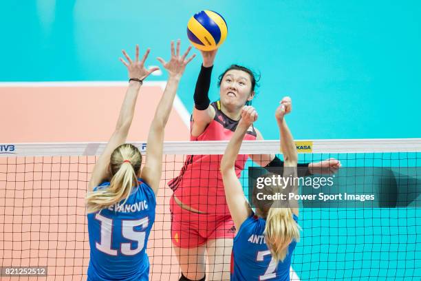 Opposite spiker Jingwen Qian of China spikes the ball during the FIVB Volleyball World Grand Prix - Hong Kong 2017 match between China and Serbia on...