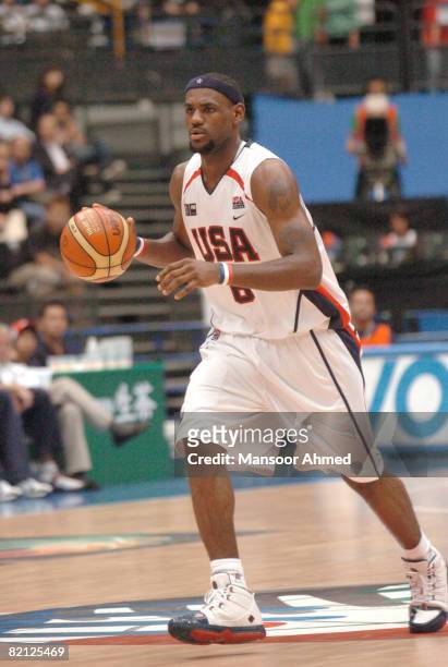 LeBron James of Team USA plays point guard during the Bronze Medal game at the FIBA World Championship 2006 at the Saitama Super Arena, Tokyo, Japan,...