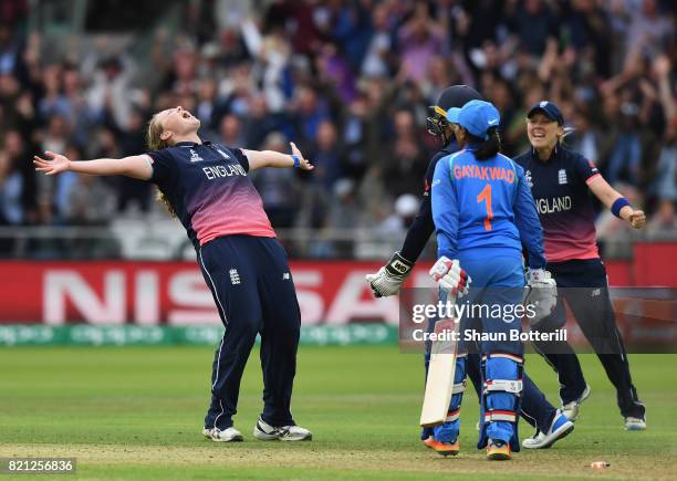 Anya Shrubsole of England celebrates with team-mates Sarah Taylor and Heather Knight after taking the final India wicket of Rajeshwari Gayakwad to...