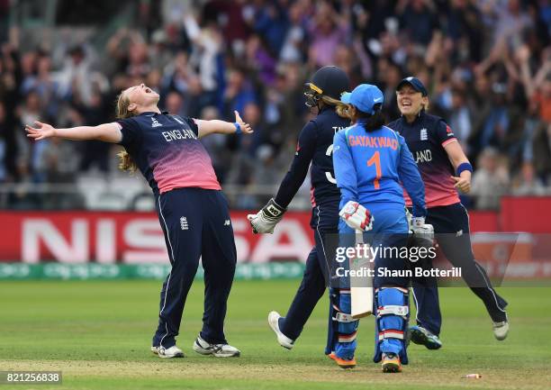 Anya Shrubsole of England celebrates with team-mates Sarah Taylor and Heather Knight after taking the final India wicket of Rajeshwari Gayakwad to...