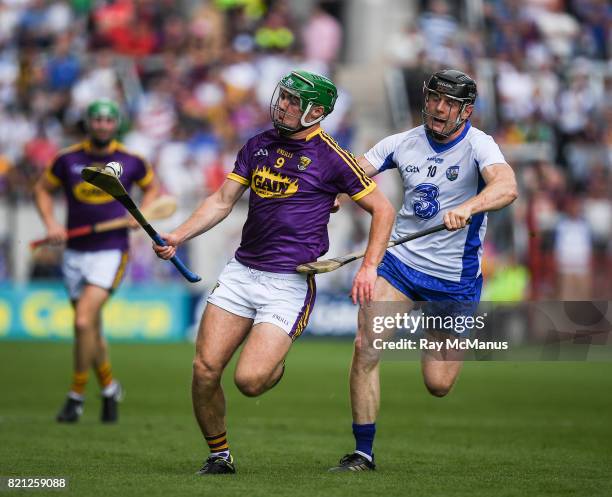 Cork , Ireland - 23 July 2017; Aidan Nolan of Wexford in action against Kevin Moran of Waterford during the GAA Hurling All-Ireland Senior...