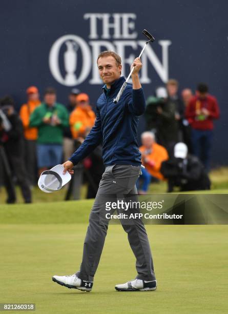 Golfer Jordan Spieth celebrates on the 18th green after his final round 69 to win the Championship on day four of the 2017 Open Golf Championship at...