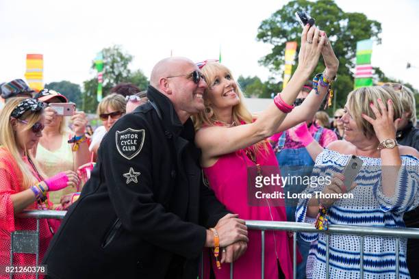 Glenn Gregory poses with fans on Day 3 of Rewind Festival at Scone Palace on July 23, 2017 in Perth, Scotland.