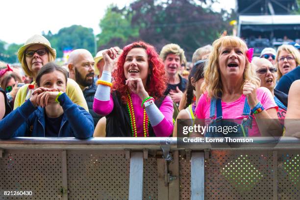 Festival goers enjoy the music on Day 3 of Rewind Festival at Scone Palace on July 23, 2017 in Perth, Scotland.