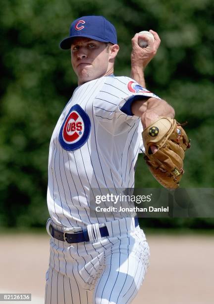 Rich Harden of the Chicago Cubs warms up before the game against the Florida Marlins on July 26, 2008 at Wrigley Field in Chicago, Illinois. The...