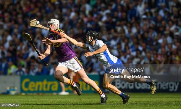 Cork , Ireland - 23 July 2017; Liam Ryan of Wexford in action against Jamie Barron of Waterford during the GAA Hurling All-Ireland Senior...