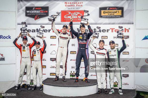 Winners The Park Place Motorsports Porsche 911 driven by Jorg Bergmeister and Patrick Lindsey , The Paul Miller Racing Lamborghini Huracan GT3 driven...