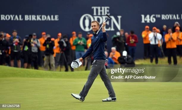 Golfer Jordan Spieth celebrates on the 18th green after his final round 69 to win the Championship on day four of the 2017 Open Golf Championship at...