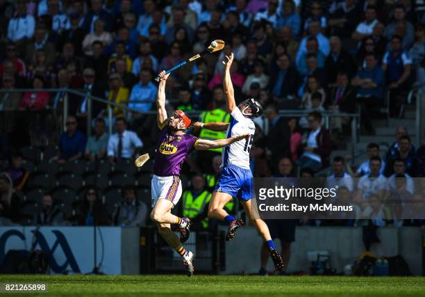 Cork , Ireland - 23 July 2017; Diarmuid O'Keeffe of Wexford in action against Darragh Fives of Waterford during the GAA Hurling All-Ireland Senior...