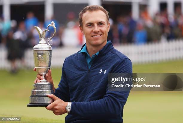 Jordan Spieth of the United States celebrates victory as he poses with the Claret Jug on the 18th green during the final round of the 146th Open...