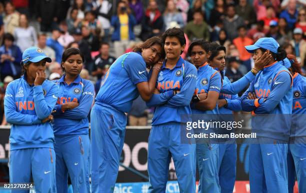 The India team are dejected after the ICC Women's World Cup 2017 Final between England and India at Lord's Cricket Ground on July 23, 2017 in London,...