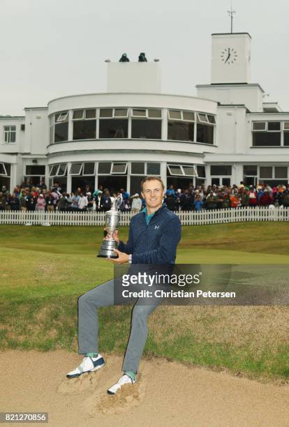 Jordan Spieth of the United States celebrates victory as he poses with the Claret Jug on the 18th green during the final round of the 146th Open...