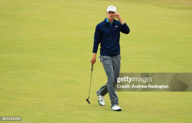 Jordan Spieth of the United States acknowledges the crowd as he walks onto the 18th green during the final round of the 146th Open Championship at...