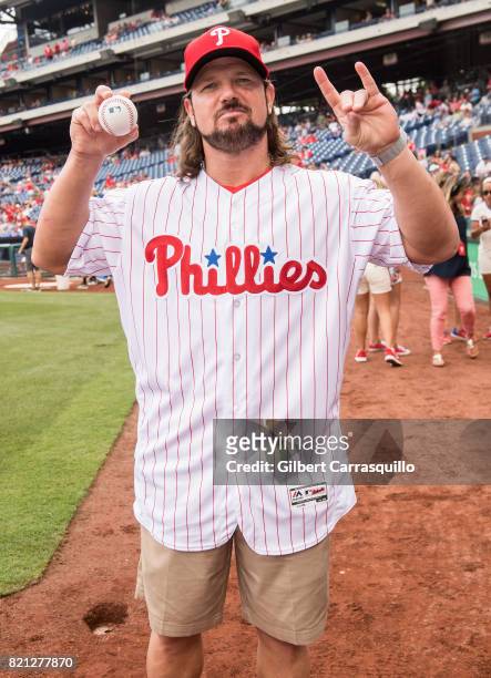 Professional wrestler A.J. Styles throws out the first pitch at the Milwaukee Brewers Vs Philadelphia Phillies Game at Citizens Bank Park on July 23,...