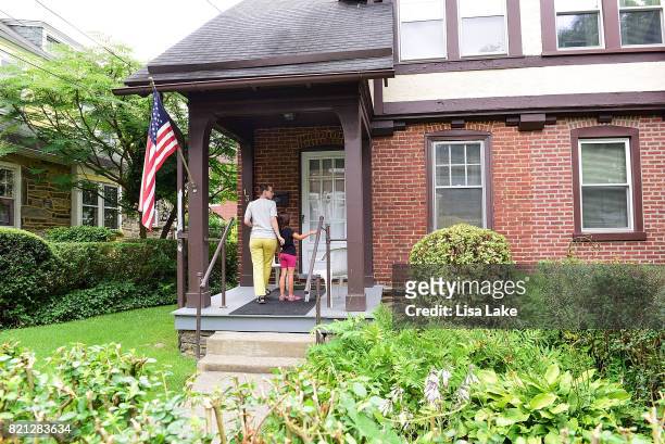 MoveOn.org member walks door to door during the Neighborhood Listening Project Healthcare Door Knocking Canvass Event on July 23, 2017 in Ardmore,...